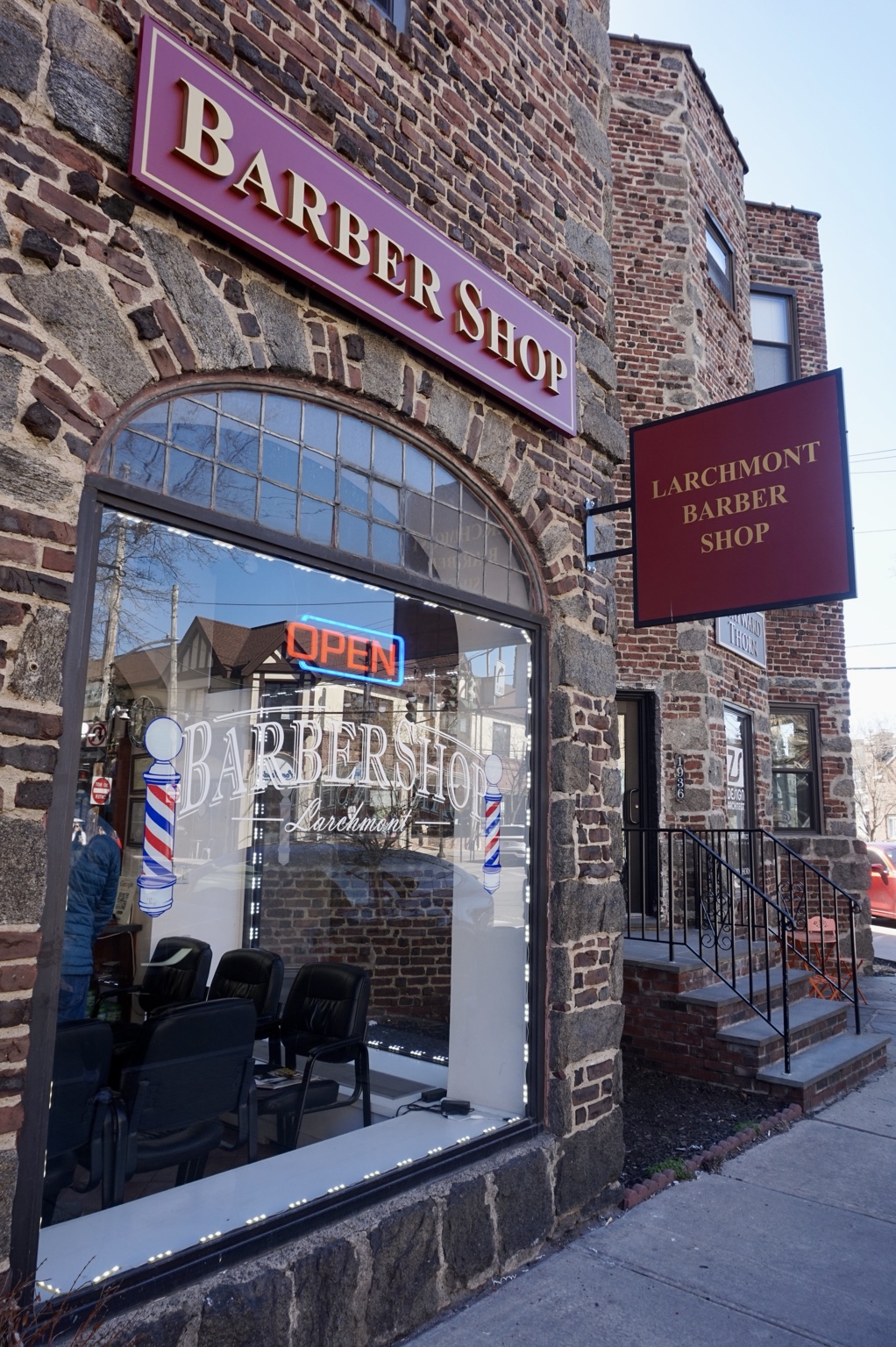 Larchmont Barber Shop storefront and sign